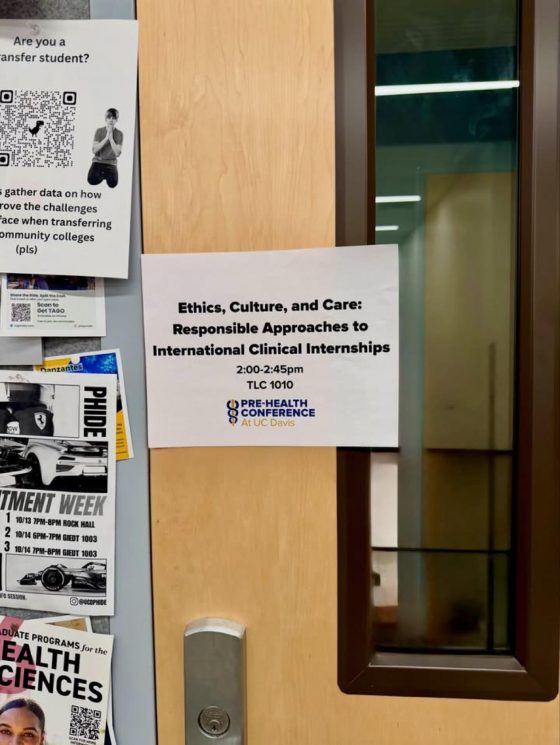 Printed sign on a classroom door reading Ethics, Culture, and Care: Responsible Approaches to International Clinical Internships, 2:00-2:45pm, TLC 1010